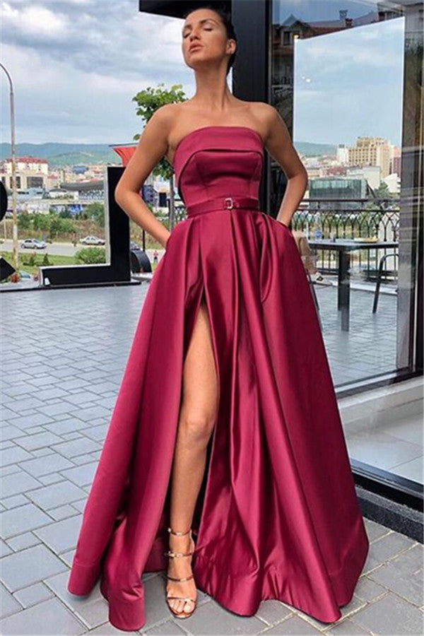 Robe longue de bal fendue sans bretelles avec poches