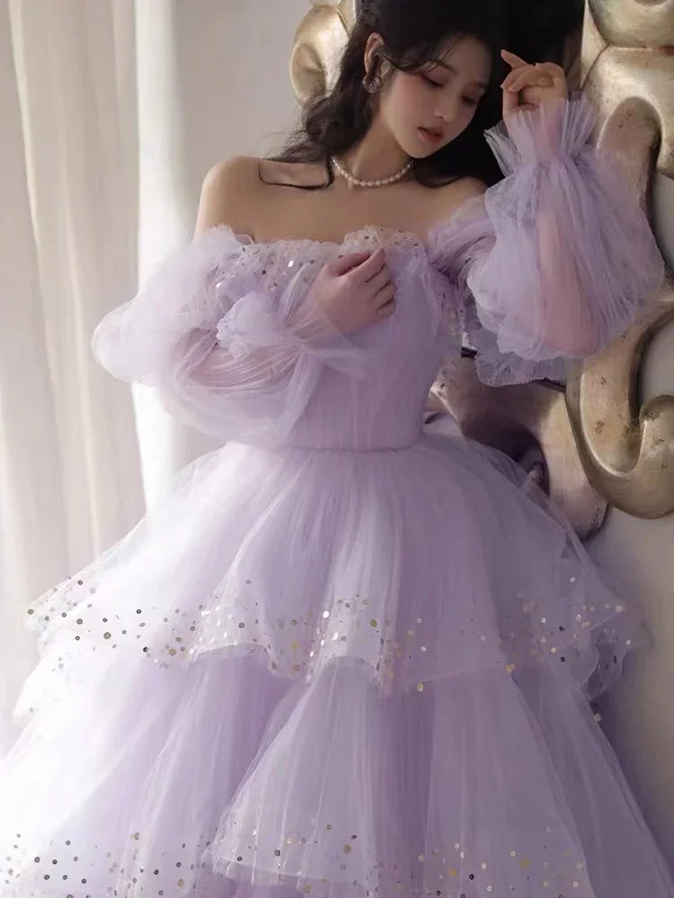 Funkelnde Abschlussballkleider Lila Abschlussballkleider Roben Cocktailkleider mit freier Schulter Langärmelige Abschlussballkleider Y2408