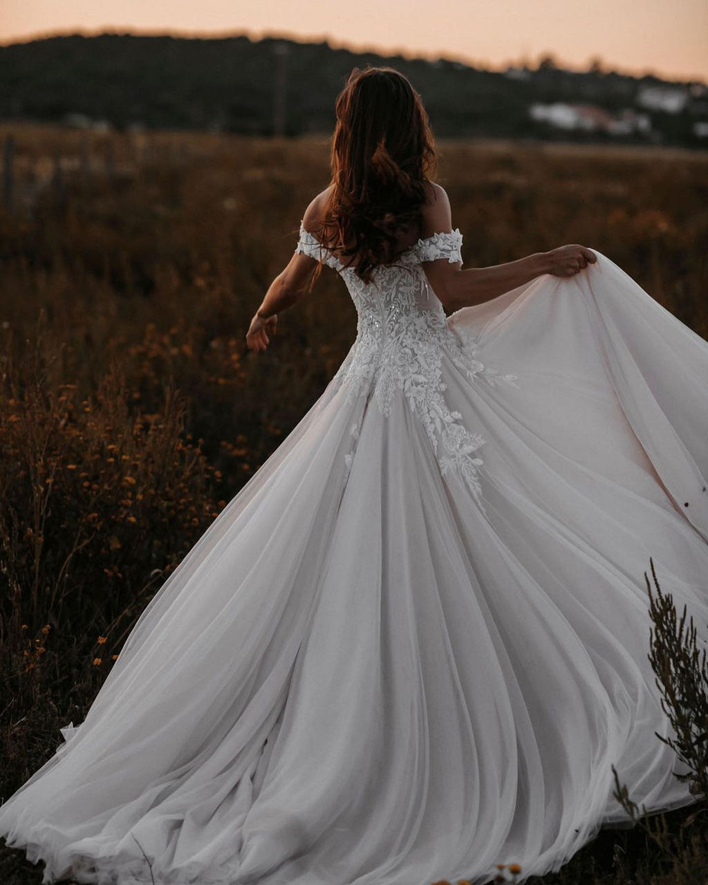 Elegant Tulle A-Line Off-The-Shoulder Wedding Dress With Applique Lace