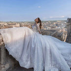 Princess Long Sleeve Wedding Dress With Sweetheart Neckline And Floral Lace