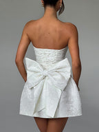 Robe courte tubulaire en jacquard élégante et sensuelle avec nœud
