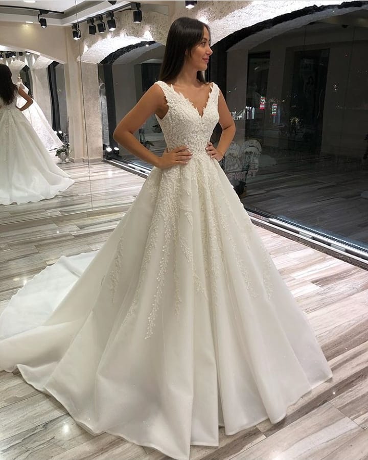 Stunning Sleeveless V Neck Long A Line Lace Wedding Dress