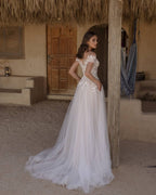 Delicate Off The Shoulder Tulle A Line Wedding Dress With Lace Appliques Pockets