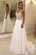 Lace Sleeveless Long Beach Wedding Dress With Elegant Flowing Silhouette