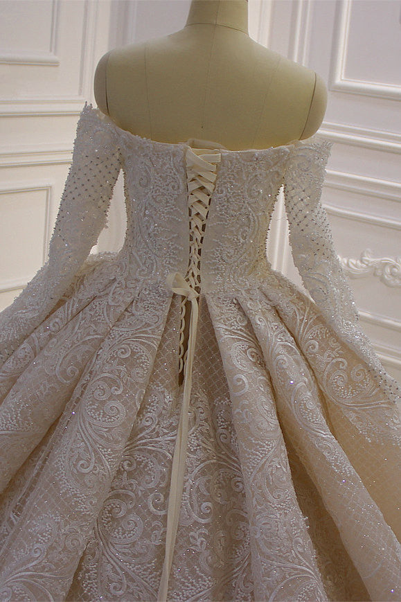 Stunning Ball Gown Wedding Dress With Off The Shoulder Sleeves And Lace Applique