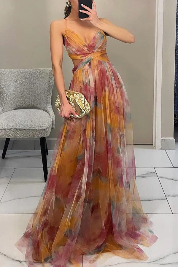 Vestido Maxi Giselle em Tule com Estampa Floral, Cintura Recortada e Abertura com Laços nas Costas