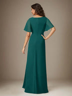 Abito a guaina blu scuro in chiffon con perline
