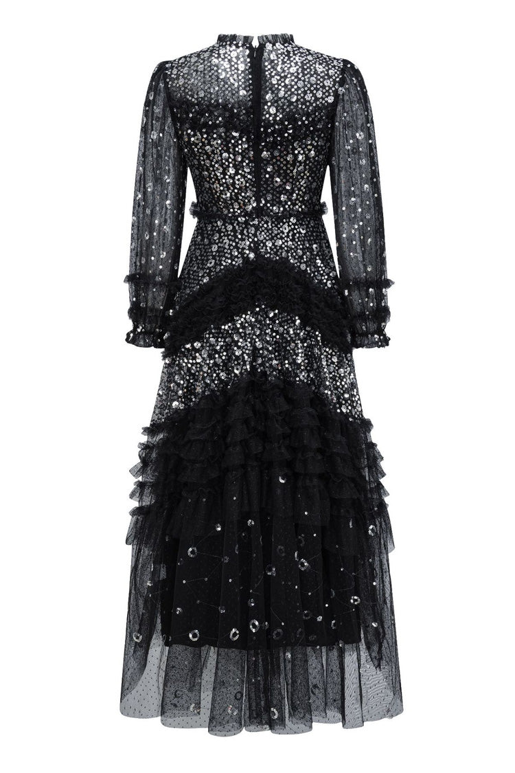 Abito da sera lungo in tulle a balze con collo alto finto, balze a pois e paillettes scintillanti