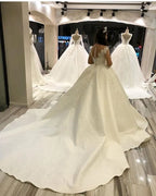 Glamorous Long Sleeves Satin Princess Wedding Dress With Appliques
