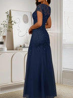 Abito in tulle con scollo a sirena e paillettes blu marina scuro