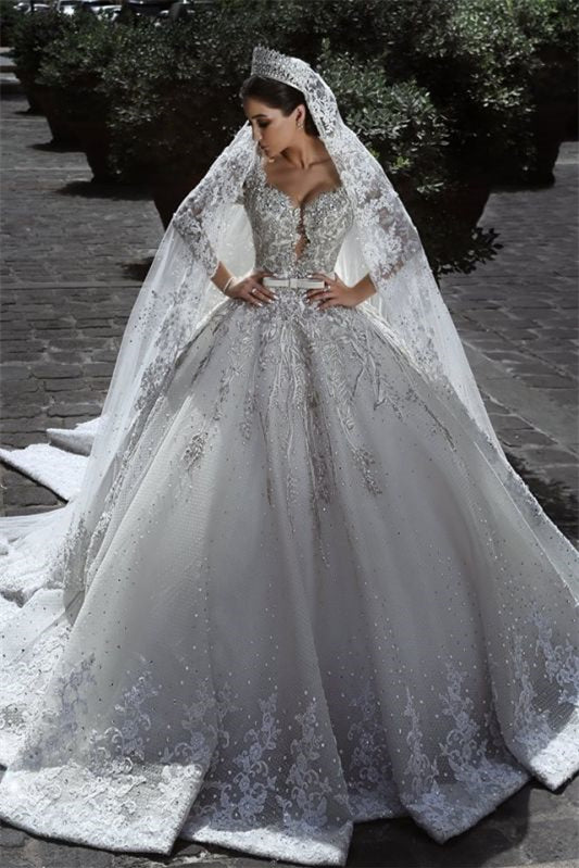 Long Sleeves Beaded Ball Gown Wedding Dress With Lace Appliques