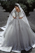 Long Sleeves Beaded Ball Gown Wedding Dress With Lace Appliques