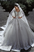 Long Sleeves Beaded Ball Gown Wedding Dress With Lace Appliques