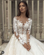 Elegant Long Sleeve Train Bateau Neckline Wedding Dress With Lace Appliques