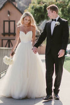 Long Tulle Spaghetti Strap Wedding Dress With Ethereal Silhouette