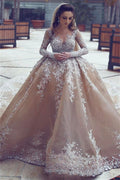 Long Sleeves Beaded Ball Gown Wedding Dress With Appliques