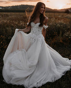Elegant Tulle A-Line Off-The-Shoulder Wedding Dress With Applique Lace