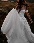 Elegant Tulle A-Line Off-The-Shoulder Wedding Dress With Applique Lace