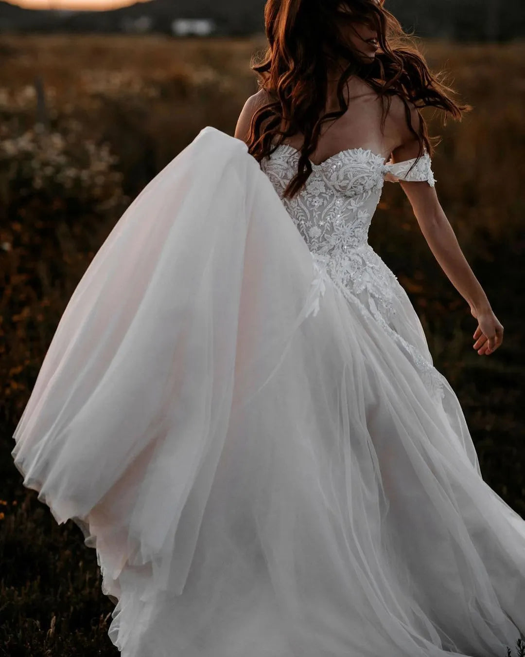 Elegant Tulle A-Line Off-The-Shoulder Wedding Dress With Applique Lace