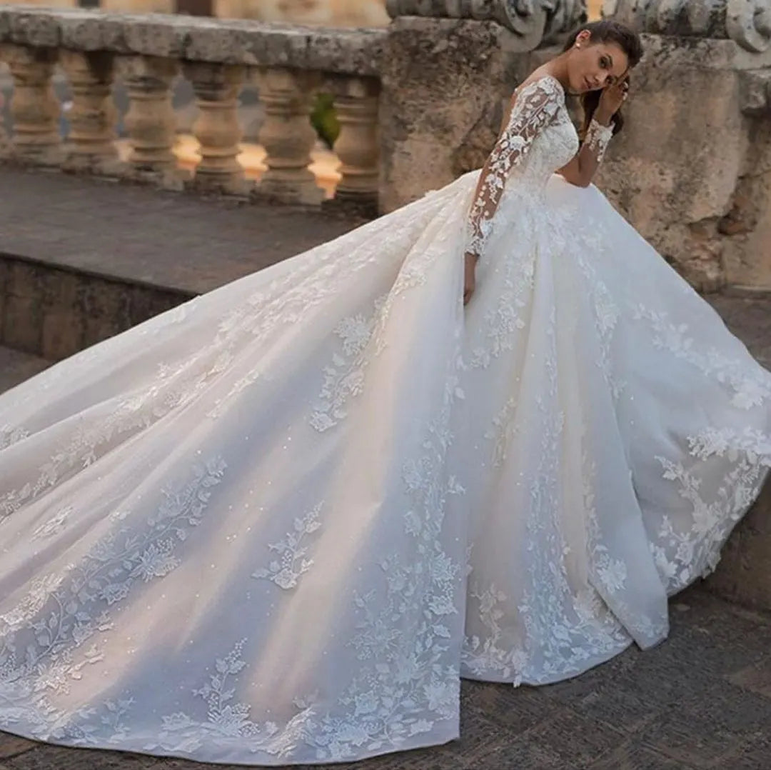 Princess Long Sleeve Wedding Dress With Sweetheart Neckline And Floral Lace