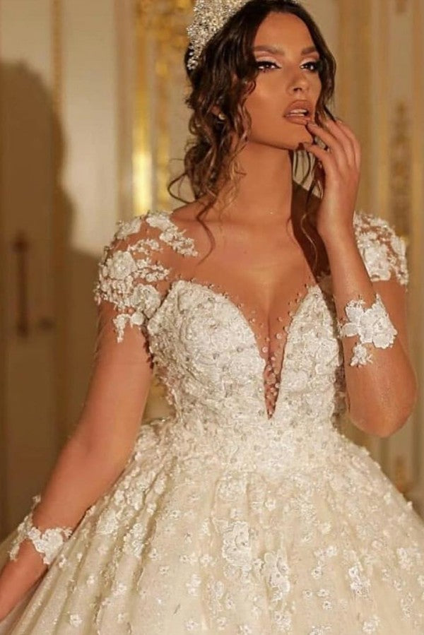 Vestido de noiva elegante com mangas compridas e aplicações de renda
