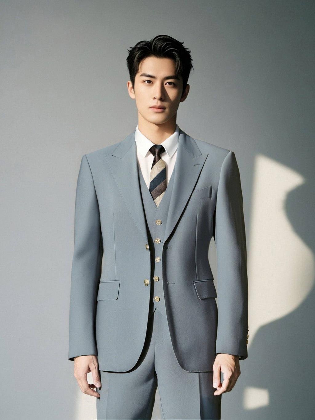 Three Piece Light Grey Wool Suit With Tailored Blazer Waistcoat And Trousers