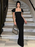 Abito da sera sexy con strass e drappeggio a cascata