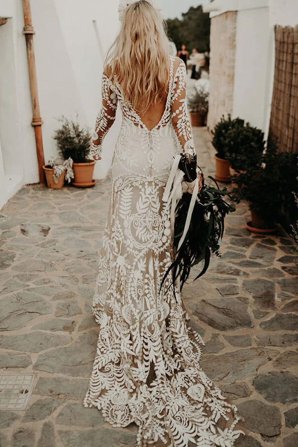 Robe de mariée bohème à manches longues en dentelle unique et ajustée