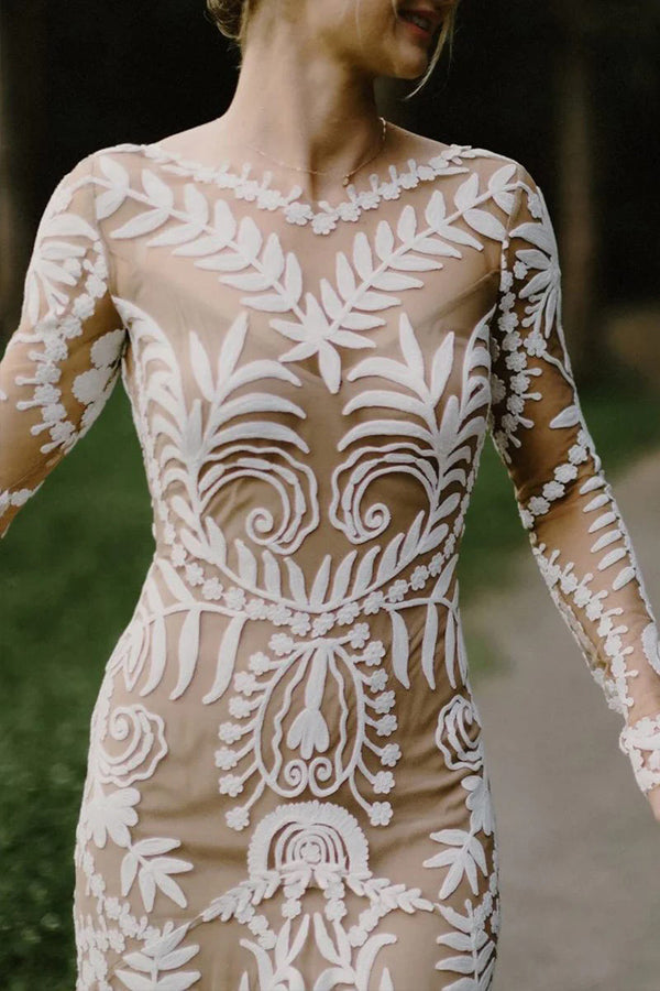 Robe de mariée bohème à manches longues en dentelle unique et ajustée