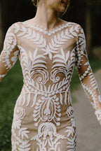 Robe de mariée bohème à manches longues en dentelle unique et ajustée
