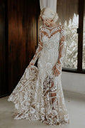 Robe de mariée bohème à manches longues en dentelle unique et ajustée