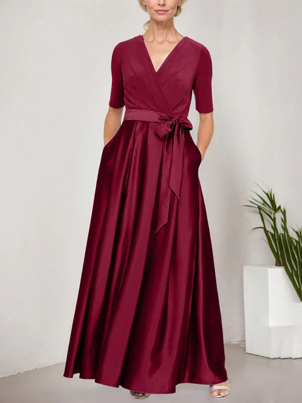 Vestido de baile con escote cruzado, falda completa de satén y cuerpo de jersey