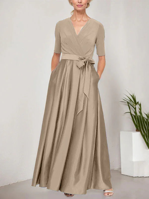 Vestido de baile con escote cruzado, falda completa de satén y cuerpo de jersey