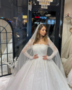 Vestido de novia de lujo de corte A con encaje, mangas largas y volantes, largo hasta el suelo