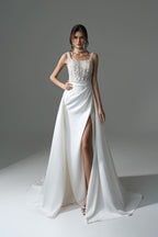 Robe de mariée élégante longue blanche en dentelle perlée sans manches, coupe évasée, avec fente
