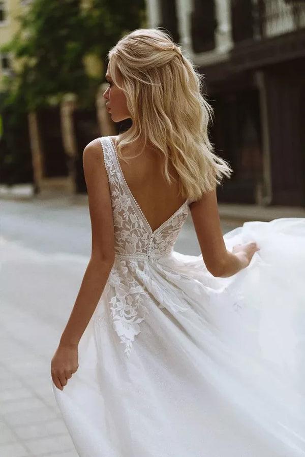 Robe de mariée élégante en dentelle, coupe évasée, col en V, pour mariage à la plage