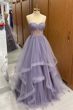 Roycebridal Brandy | Abito lungo da ballo senza spalline color lilla con balze di tulle e perline a strati