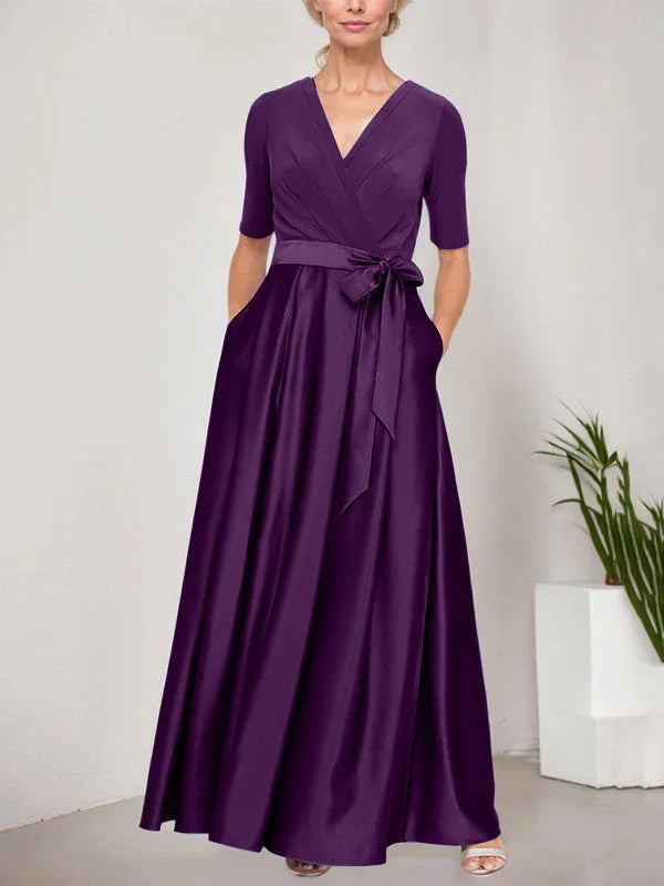 Vestido de baile con escote cruzado, falda completa de satén y cuerpo de jersey