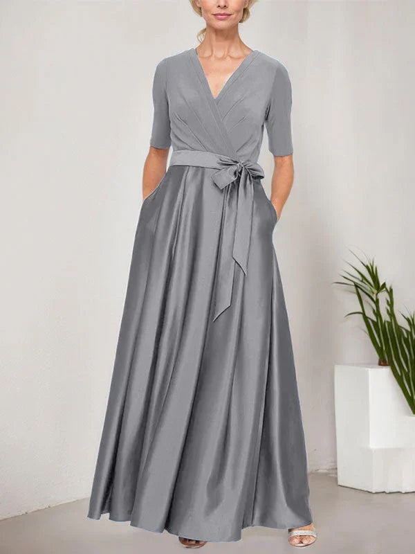 Vestido de baile con escote cruzado, falda completa de satén y cuerpo de jersey