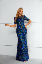 Abito lungo sirena con collo a illusione, decorato con paillettes blu reale, maniche a gomito
