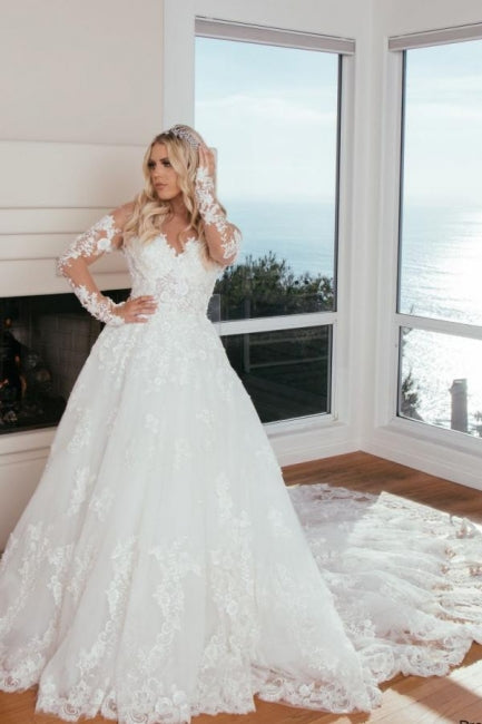 Vestido de novia princesa de corte A con escote corazón y mangas largas con encaje