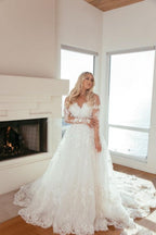 Vestido de novia princesa de corte A con escote corazón y mangas largas con encaje