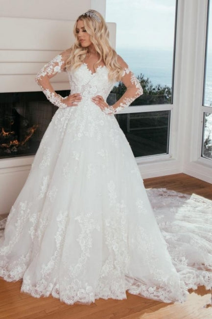 Vestido de novia princesa de corte A con escote corazón y mangas largas con encaje