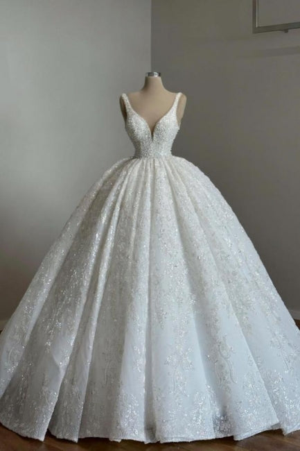 Lujosos vestidos de novia de princesa con escote en V, encaje, cuentas, sin mangas y brillo.