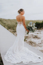 Vestido de novia de manga larga con apliques de tul y escote corazón de sirena
