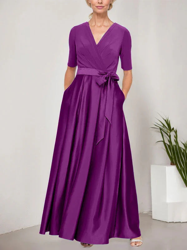 Vestido de baile con escote cruzado, falda completa de satén y cuerpo de jersey