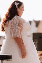 Plus Size White A-Line Wedding Dress V Neck Flutter Cape Sleeves Floral Embroidery Crystal Belt Glitter Tulle Bridal Gown with Sweep Train