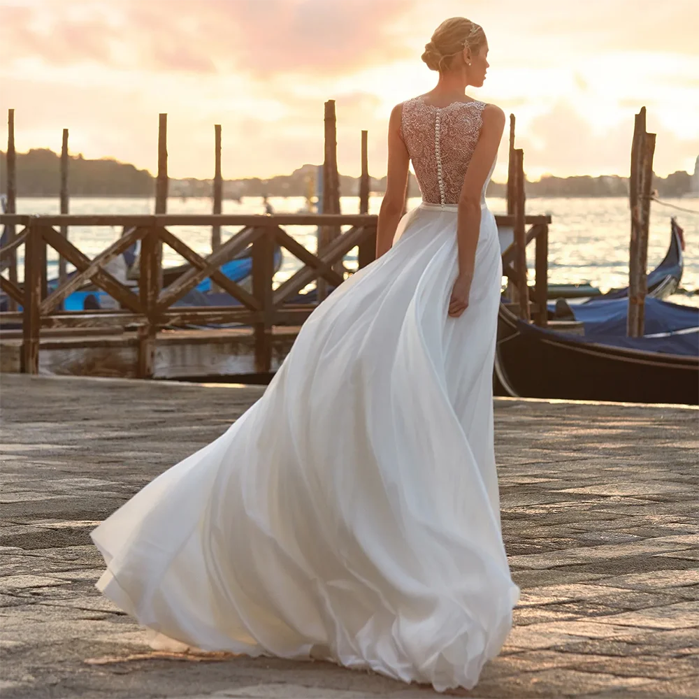 Einfaches großzügiges A-Linien Chiffon Damen Hochzeitskleid V-Ausschnitt Ärmellos Spitzenapplikationen Brautkleid Maßgeschneiderte Brautkleider Hochzeit