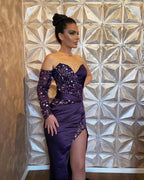 Abito da sera lungo a sirena con maniche lunghe e paillettes, con spacco