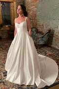 Robe de mariée ivoire à larges bretelles simples avec poches